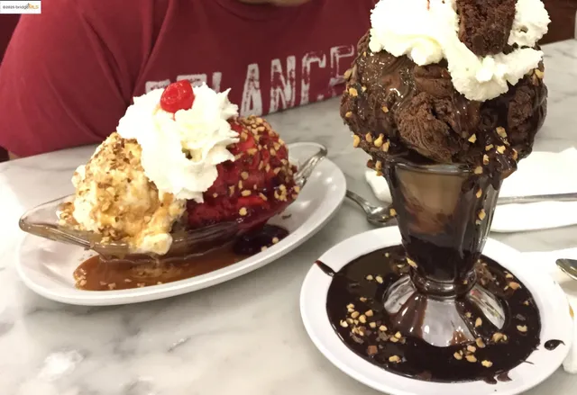 a view of a vase of flowers sitting on a table