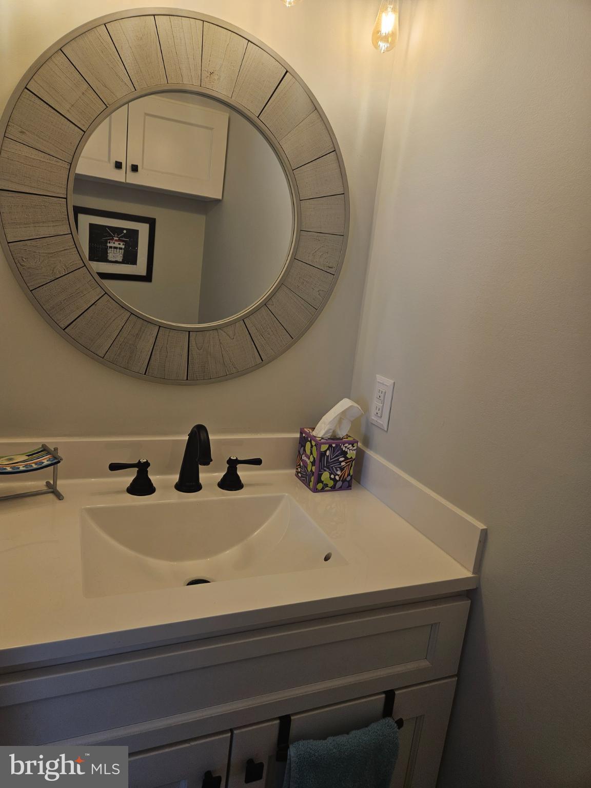 200 Market Square, Unit 14A Cambridge, MD 21613 - Photo 13 of 59 Chic guest bath with modern accents.