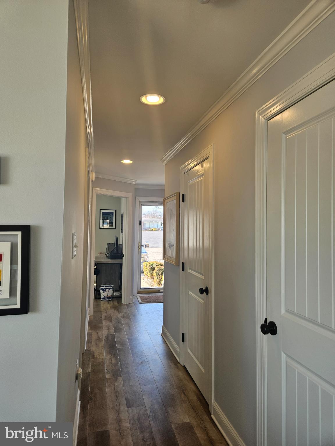 200 Market Square, Unit 14A Cambridge, MD 21613 - Photo 14 of 59 Bright and inviting hallway with modern charm.
