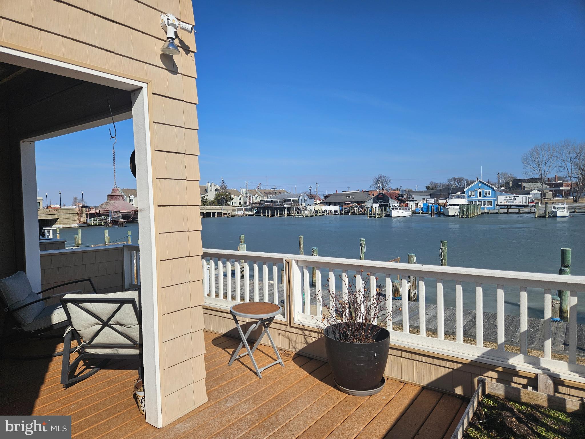 200 Market Square, Unit 14A Cambridge, MD 21613 - Photo 17 of 59 Serene waterfront view from a cozy deck.