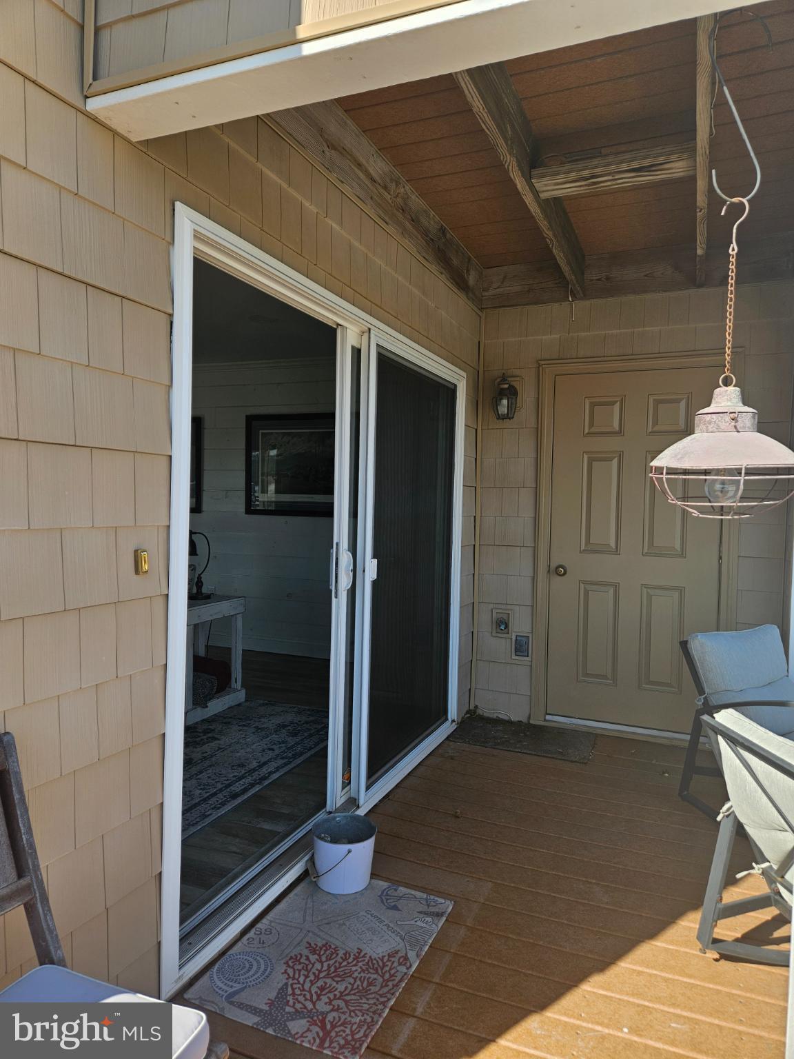 200 Market Square, Unit 14A Cambridge, MD 21613 - Photo 22 of 59 Patio doors open to covered deck area