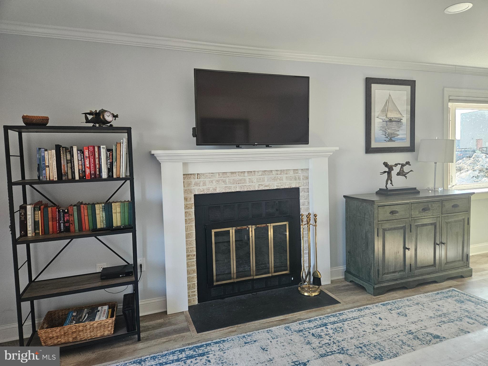 200 Market Square, Unit 14A Cambridge, MD 21613 - Photo 25 of 59 Cozy living space with inviting fire place