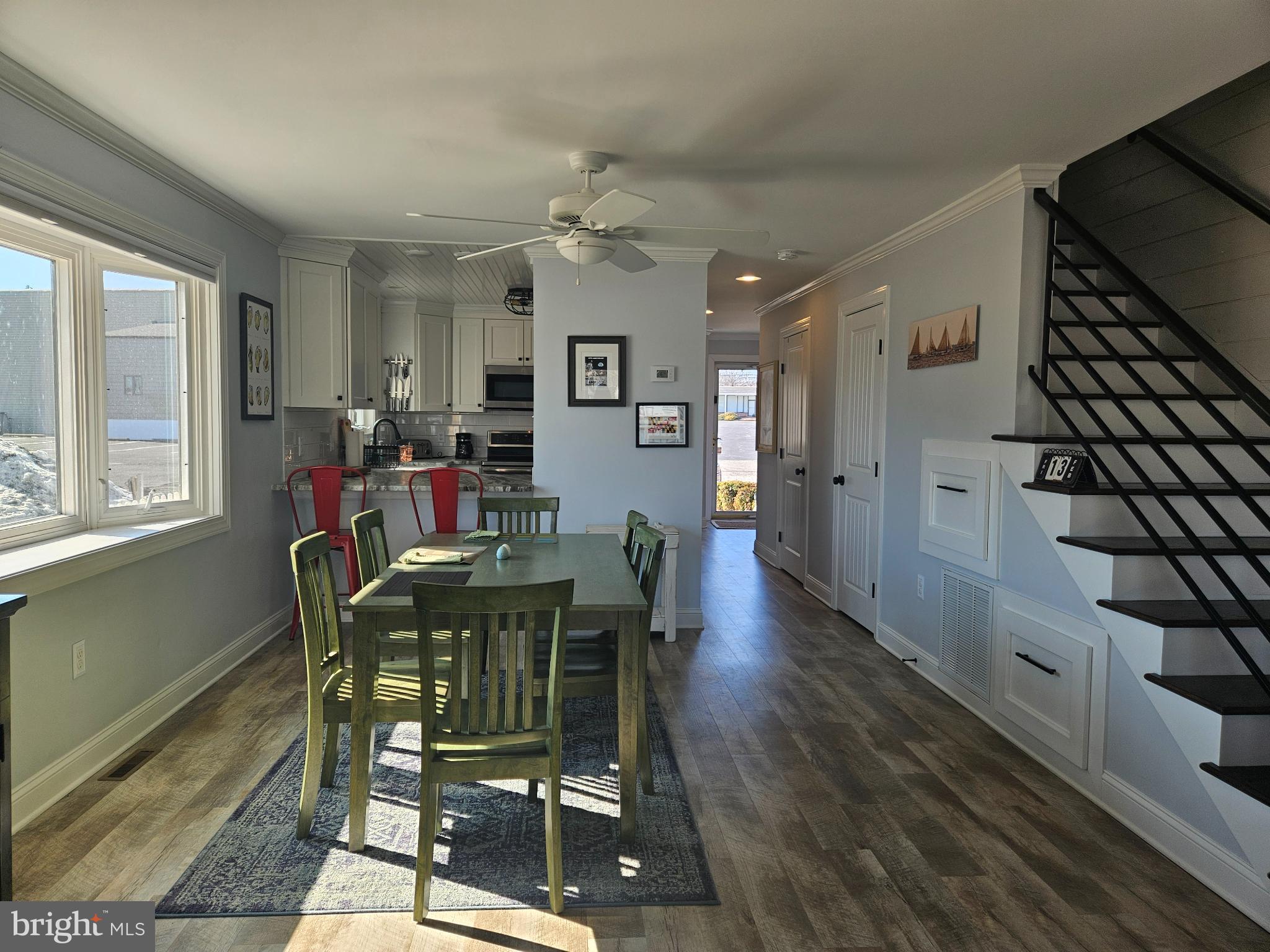 200 Market Square, Unit 14A Cambridge, MD 21613 - Photo 26 of 59 Bright and inviting open-concept living space.