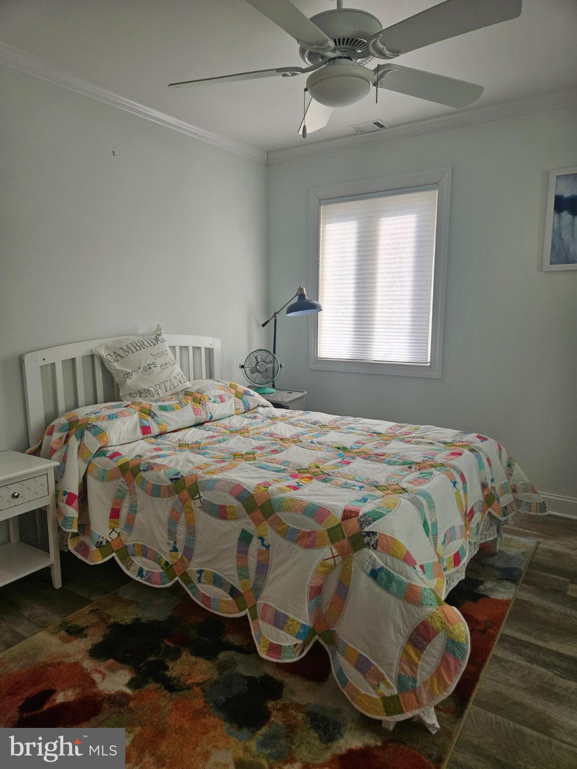 200 Market Square, Unit 14A Cambridge, MD 21613 - Photo 30 of 59 Bright and inviting guest bedroom retreat.