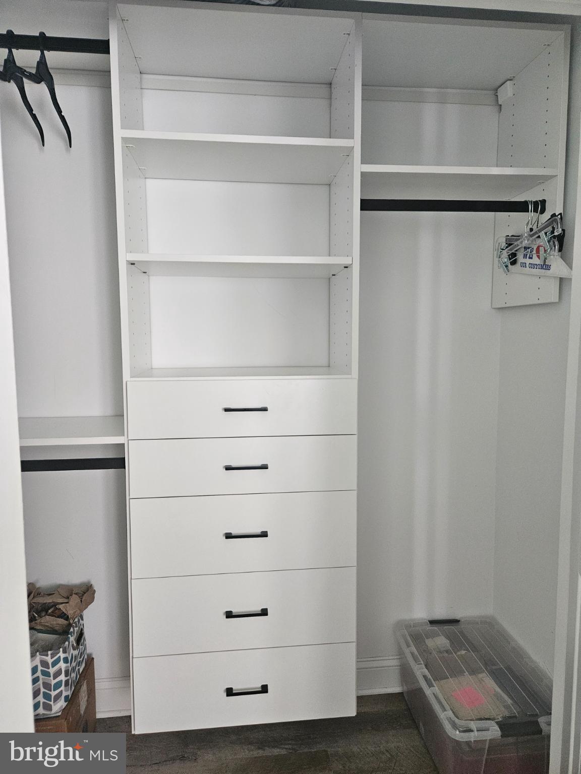 200 Market Square, Unit 14A Cambridge, MD 21613 - Photo 31 of 59 Sleek, modern closet storage solution.