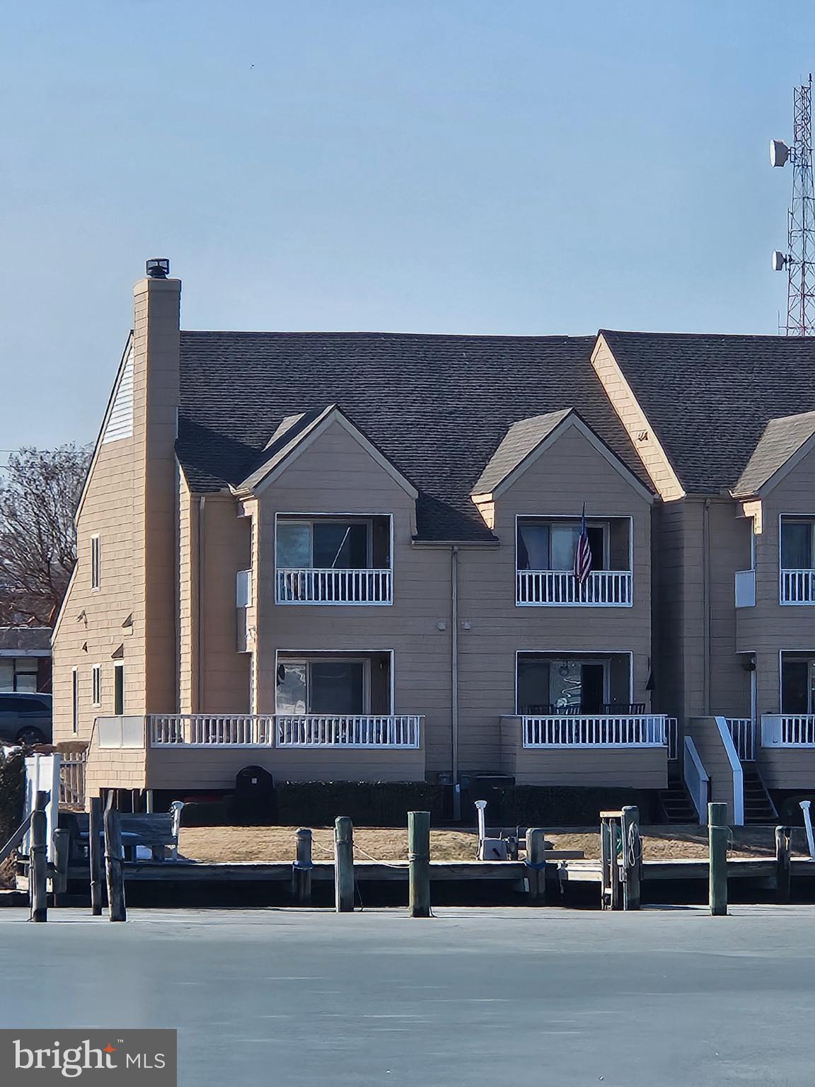 200 Market Square, Unit 14A Cambridge, MD 21613 - Photo 56 of 59 Backside of end unit condo with upper & lower deck