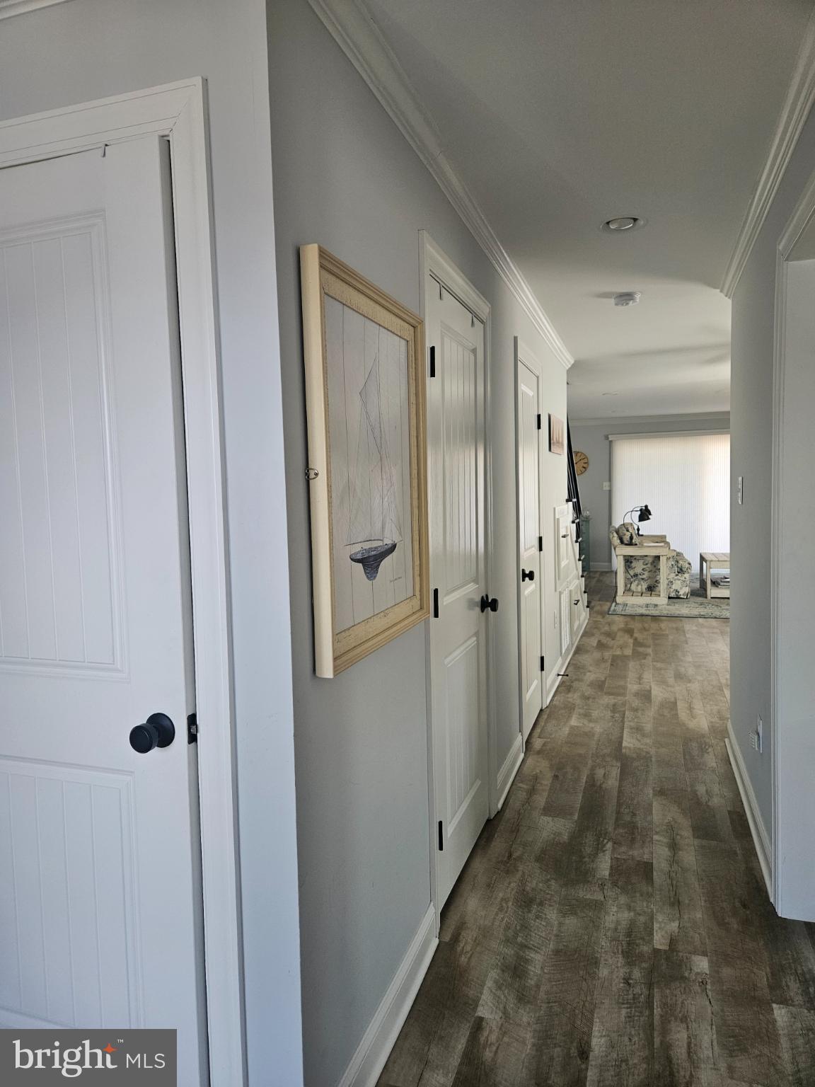 200 Market Square, Unit 14A Cambridge, MD 21613 - Photo 6 of 59 Inviting hallway with coastal charm.