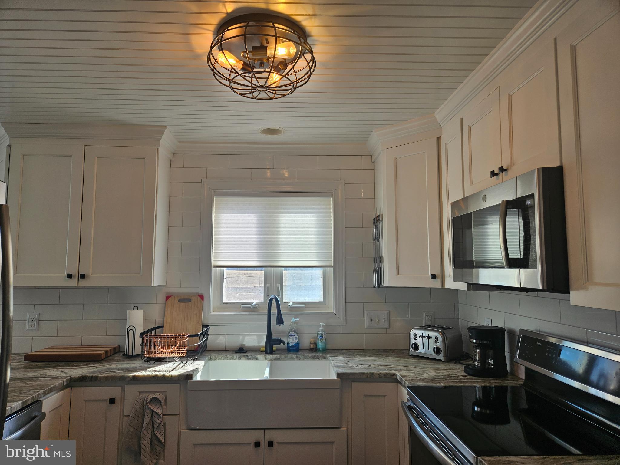 200 Market Square, Unit 14A Cambridge, MD 21613 - Photo 9 of 59 Modern kitchen space with large farm sink