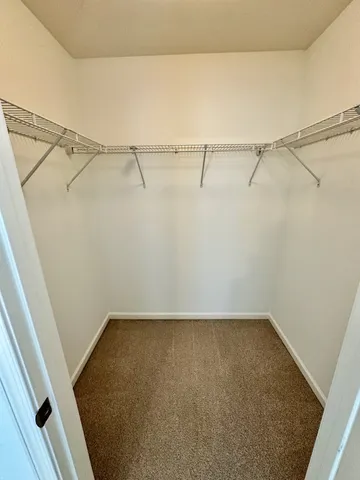 a view of a room with racks on the wall