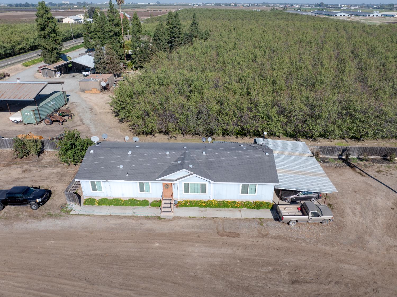 3918 South Kilroy Road Turlock, CA 95380 - Photo 12 of 13 an aerial view of a house with a big yard