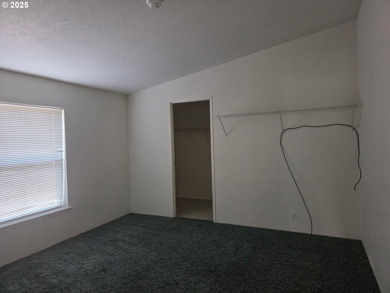 9225 Millcreek Road Tillamook, OR 97141 - Photo 12 of 19 an empty room with windows