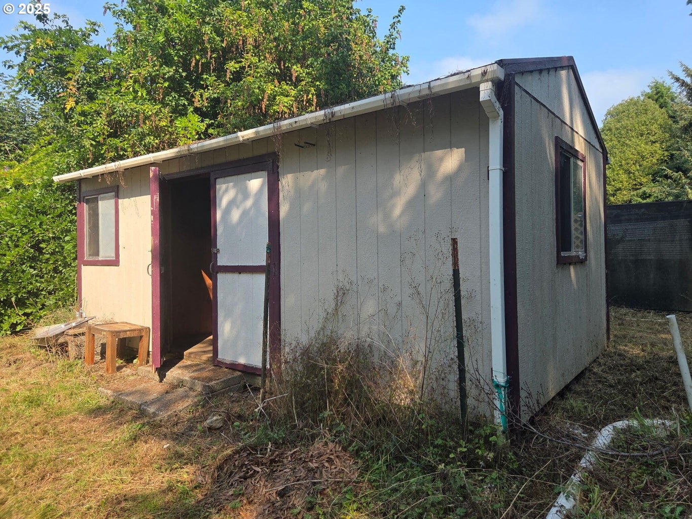 9225 Millcreek Road Tillamook, OR 97141 - Photo 15 of 19 a backyard of a house with lots of green space