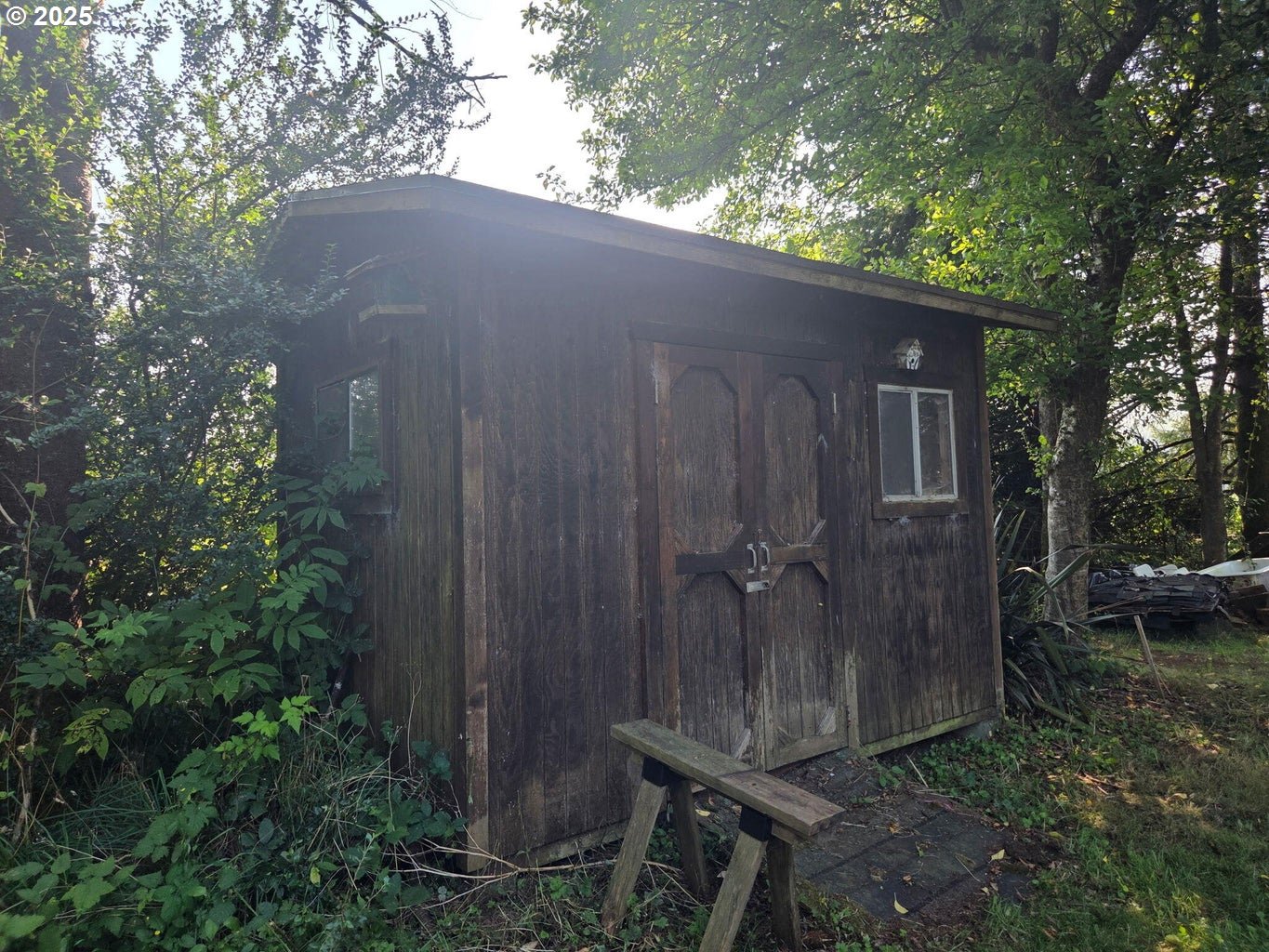 9225 Millcreek Road Tillamook, OR 97141 - Photo 17 of 19 a backyard of a house with lots of green space