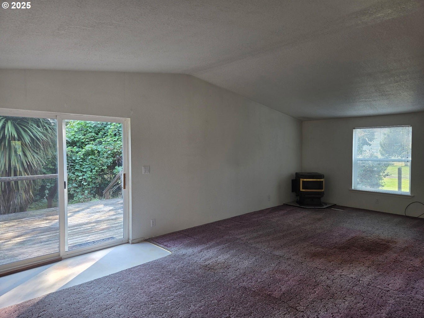 9225 Millcreek Road Tillamook, OR 97141 - Photo 5 of 19 a view of a big room with windows