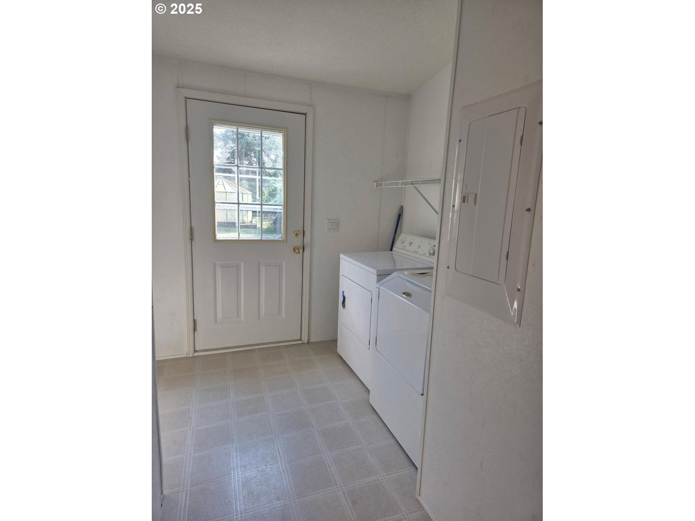 9225 Millcreek Road Tillamook, OR 97141 - Photo 9 of 19 a view of a bathroom with sink and mirror