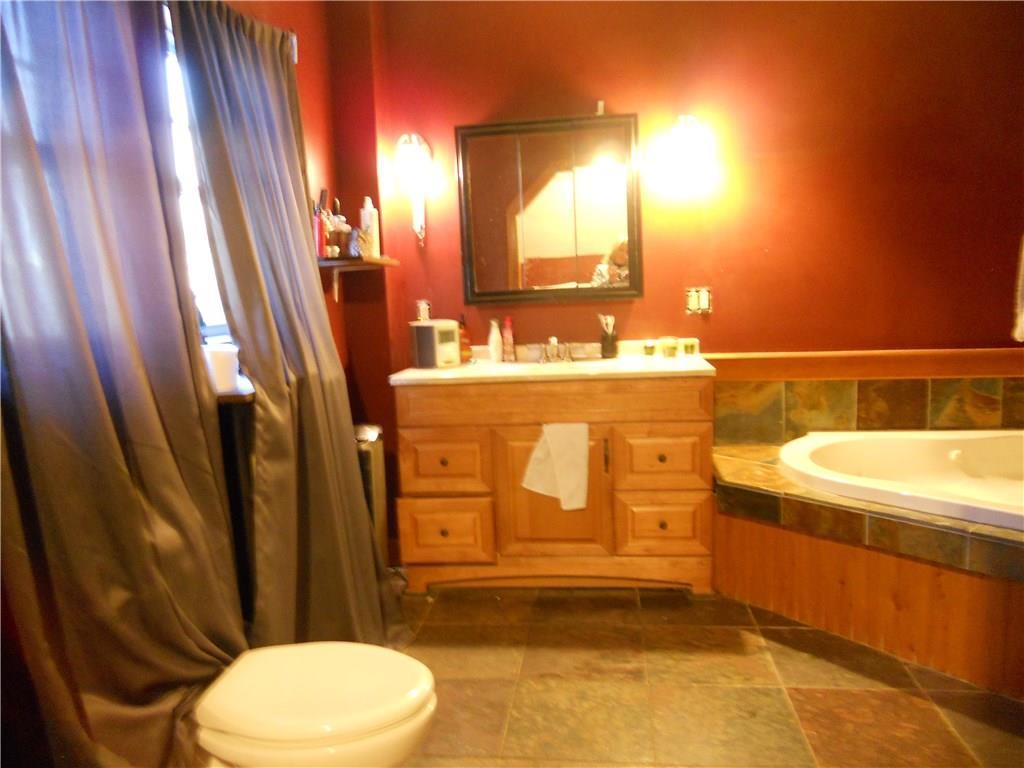 5 Maple Street Augusta, ME 04330 - Photo 8 of 32 Main unit custom bath with tile,...
