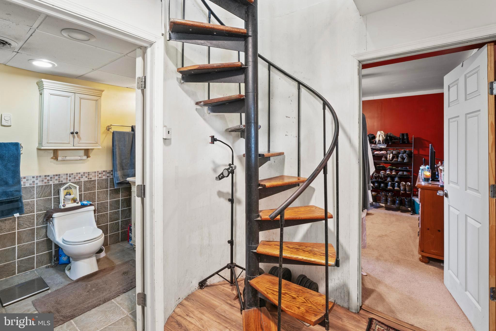 870 Downe Avenue Fortescue, NJ 08321 - Photo 16 of 26 a view of a hallway with wooden floor and staircase
