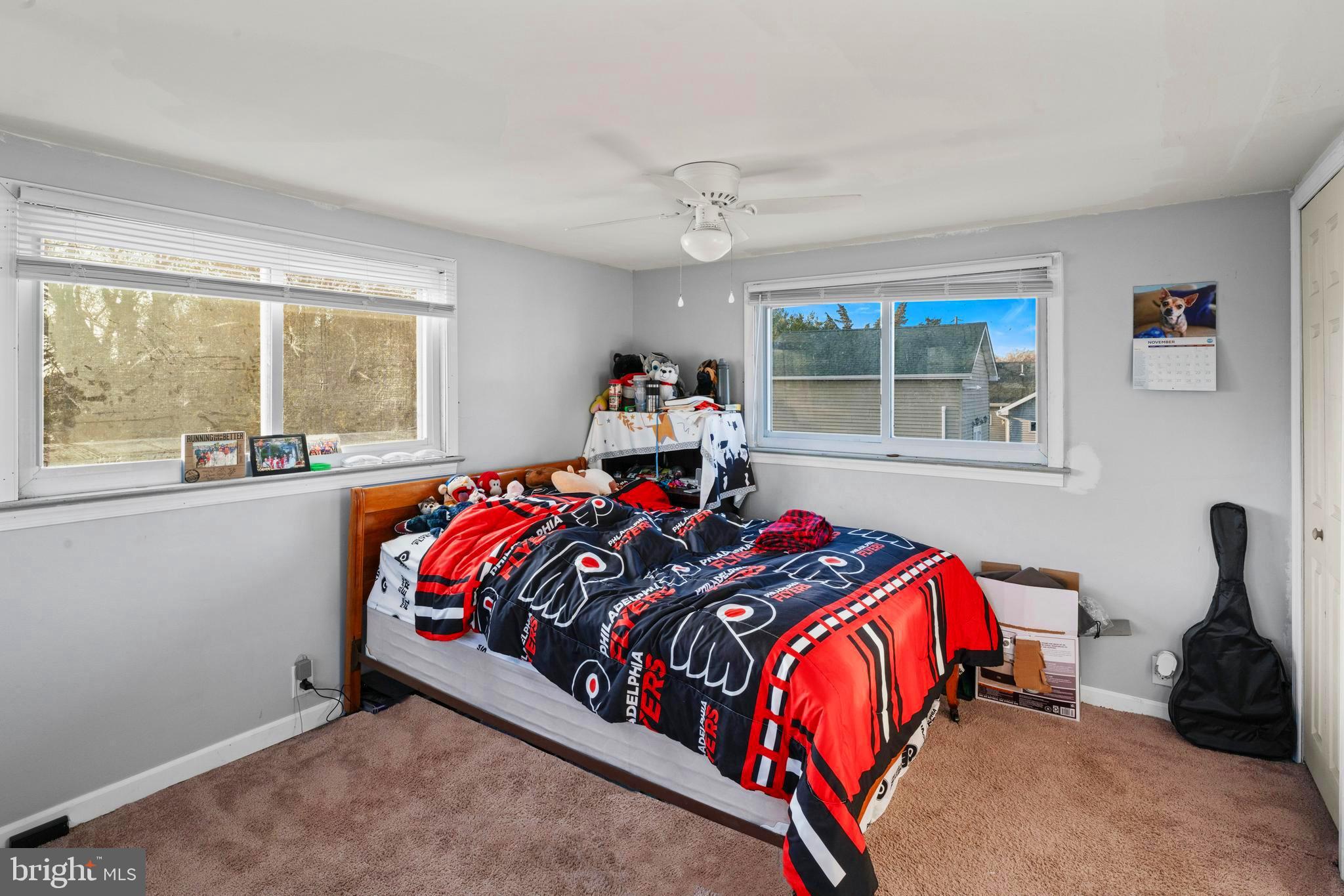 870 Downe Avenue Fortescue, NJ 08321 - Photo 17 of 26 a bed sitting in a bedroom next to a window