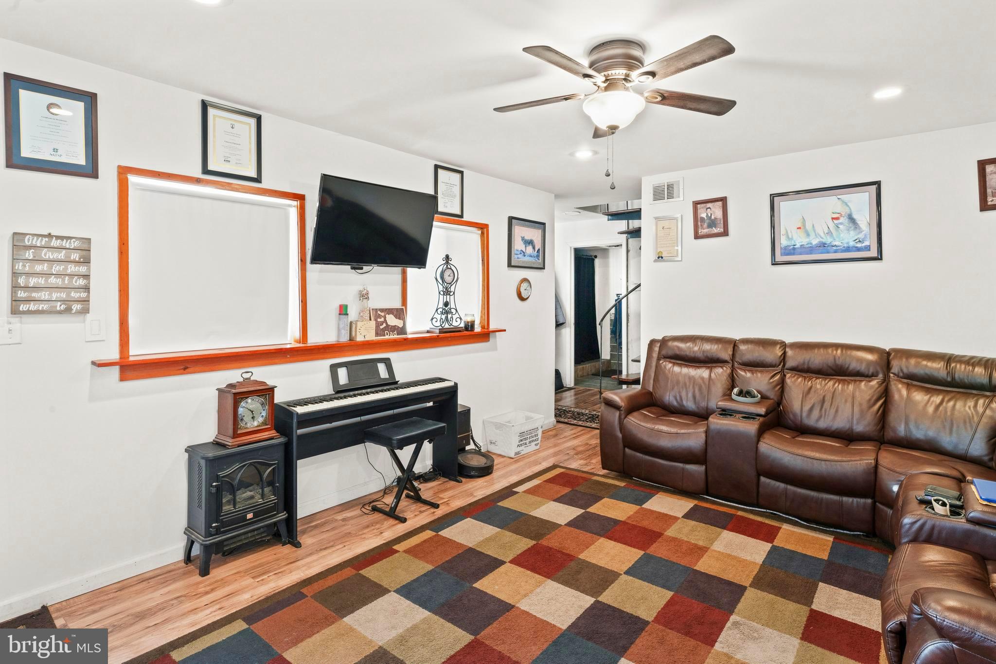 870 Downe Avenue Fortescue, NJ 08321 - Photo 5 of 26 a living room with furniture and a flat screen tv