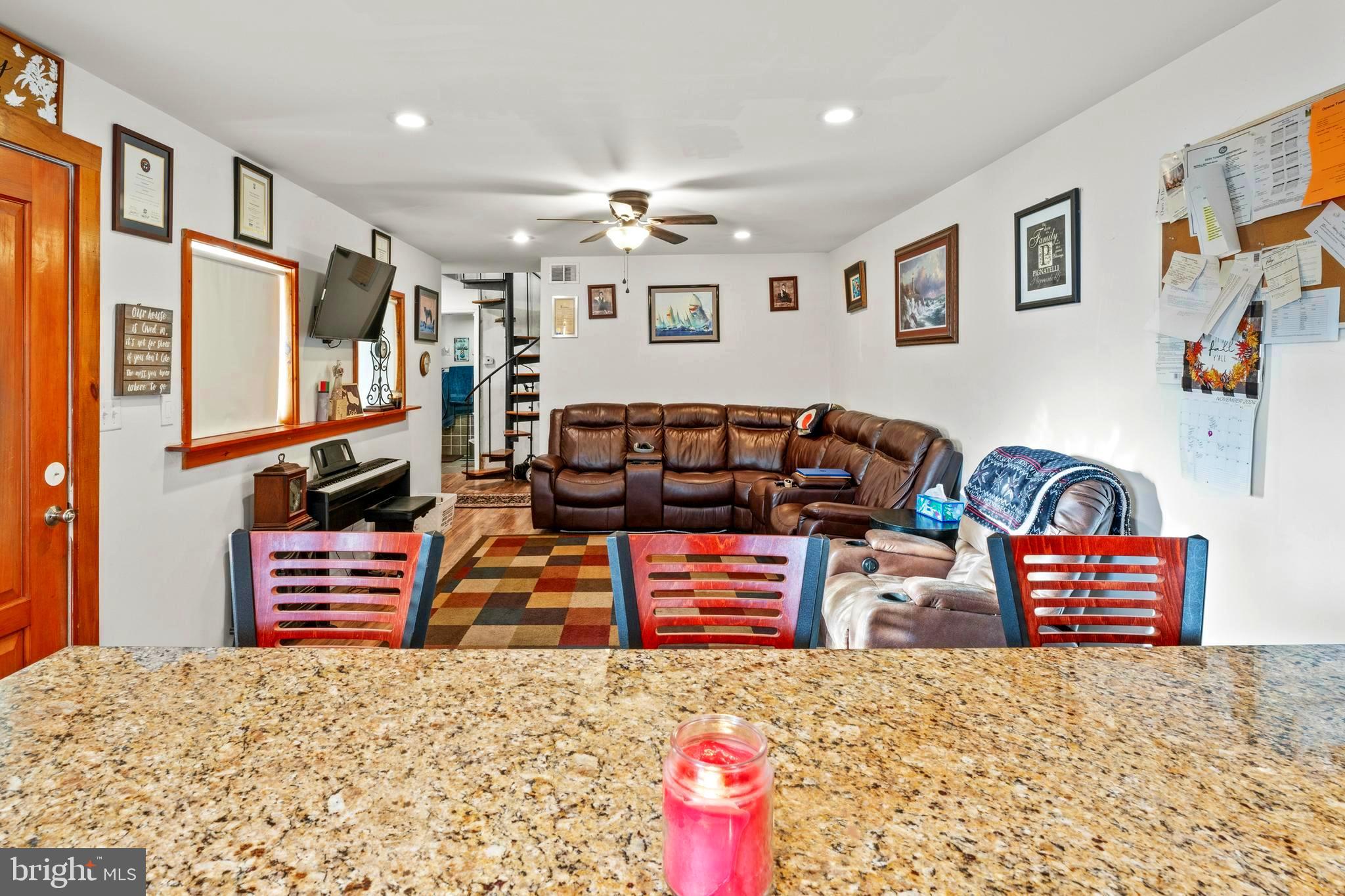 870 Downe Avenue Fortescue, NJ 08321 - Photo 9 of 26 a bedroom with furniture and a couch