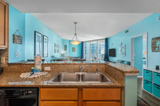 a bedroom with a bed and a night stand