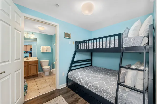 a view of a chairs and table in a backyard