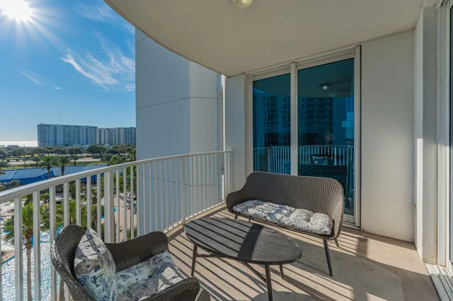 a view of a hallway with a bathroom