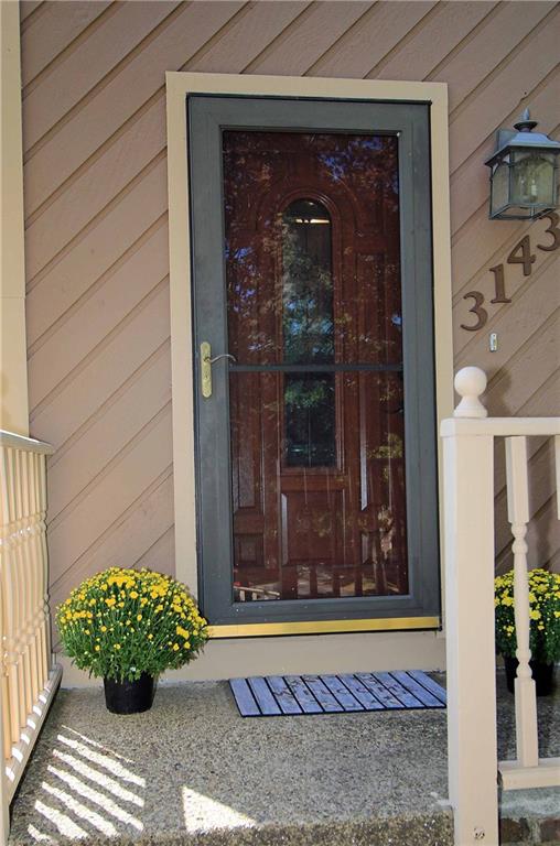 3143 Laurel Ridge Circle Bridgeville, PA 15017 - Photo 3 of 25 Front Entry has updated front door with decorative glass and full view storm door.