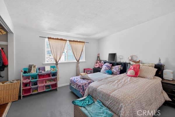 13391 Mesquite Road Whitewater, CA 92282 - Photo 26 of 27 a bedroom with two beds and a window