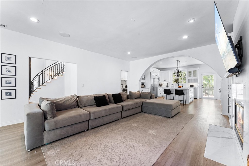 927 Avocado Crest Road La Habra Heights, CA 90631 - Photo 19 of 72 a living room with furniture and a large window