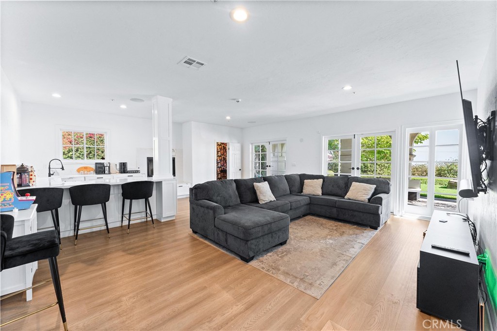 927 Avocado Crest Road La Habra Heights, CA 90631 - Photo 21 of 72 a living room with furniture and a wooden floor