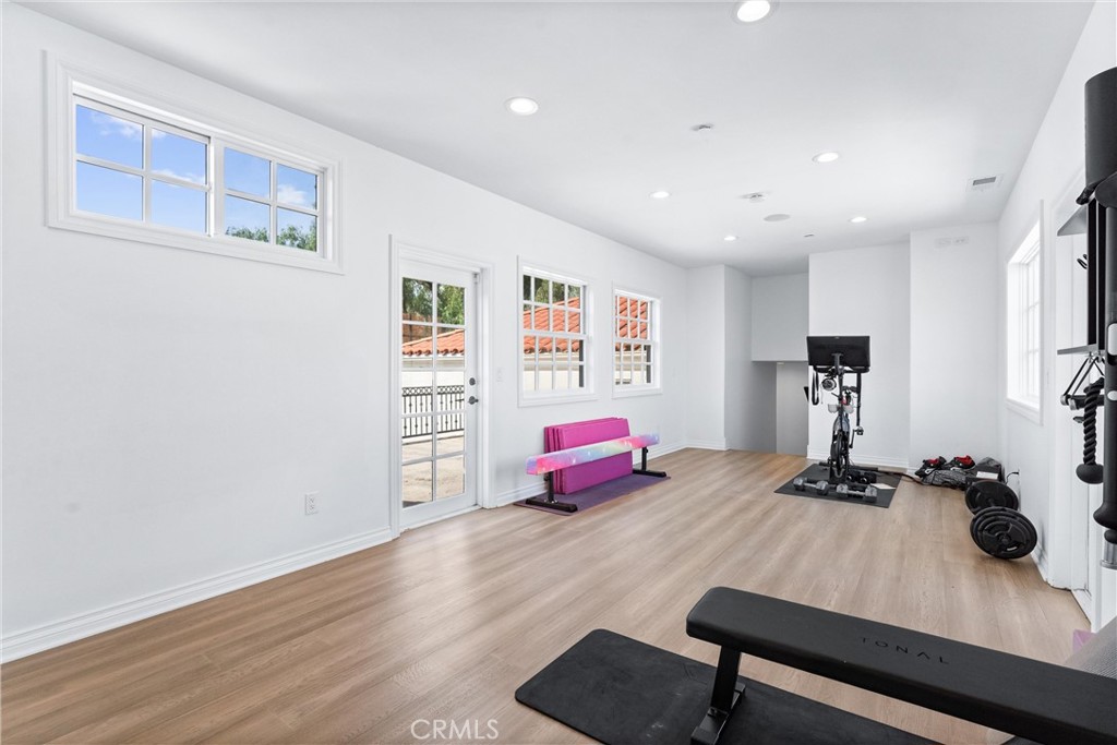 927 Avocado Crest Road La Habra Heights, CA 90631 - Photo 24 of 72 a room with furniture and wooden floor