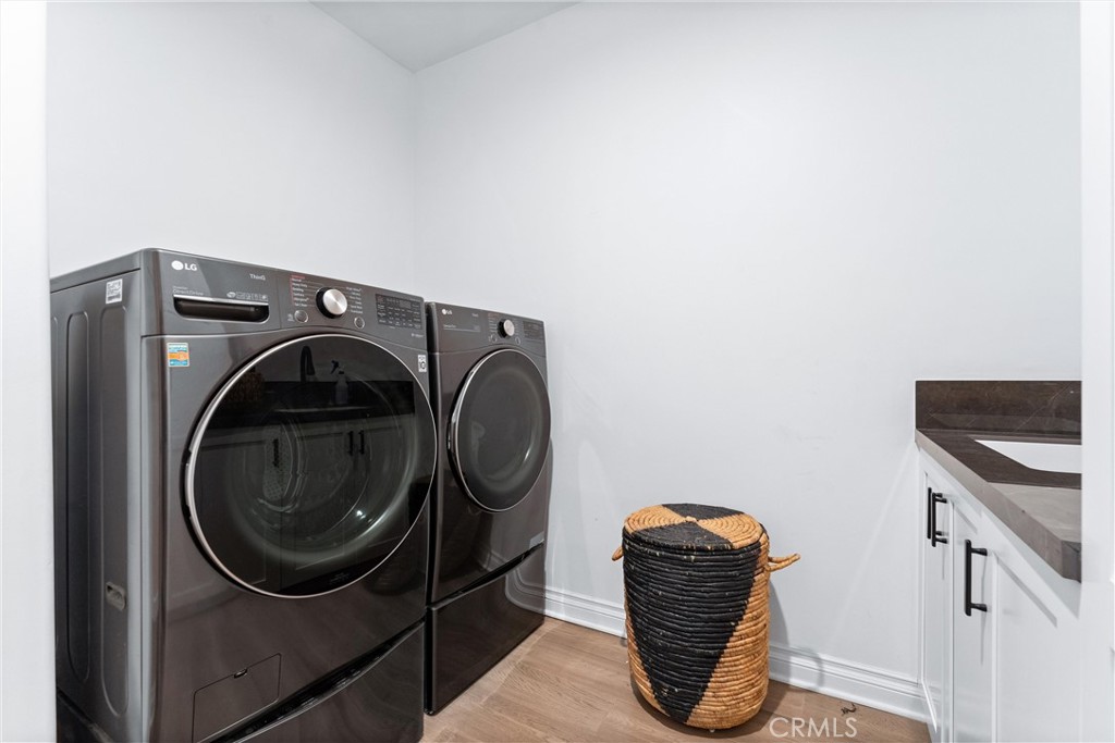 927 Avocado Crest Road La Habra Heights, CA 90631 - Photo 39 of 72 a utility room with dryer and washer