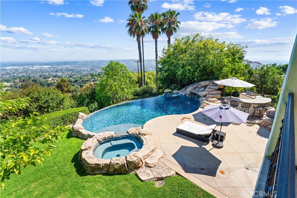 927 Avocado Crest Road La Habra Heights, CA 90631 - Photo 50 of 72 an aerial view of a house with garden space and trees all around