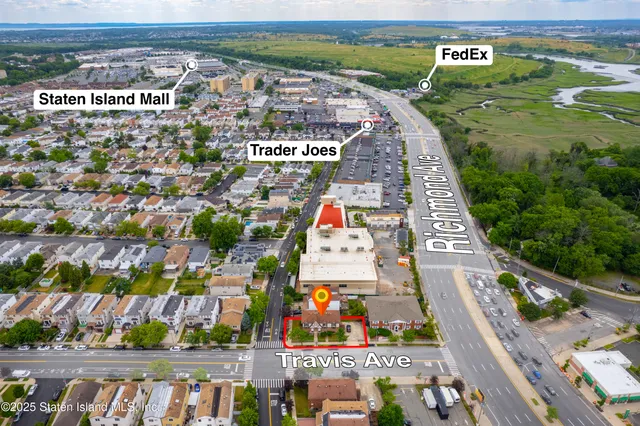 a view of a food mall next to a road