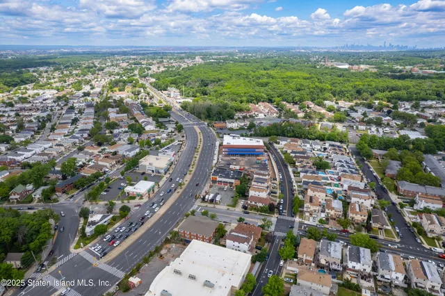 a view of a building with sitting area