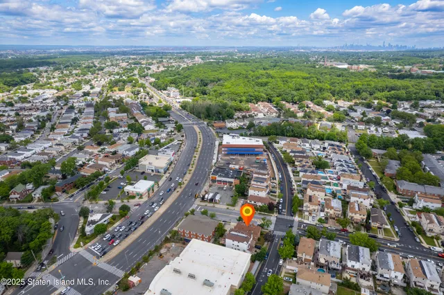 a view of a street with cars