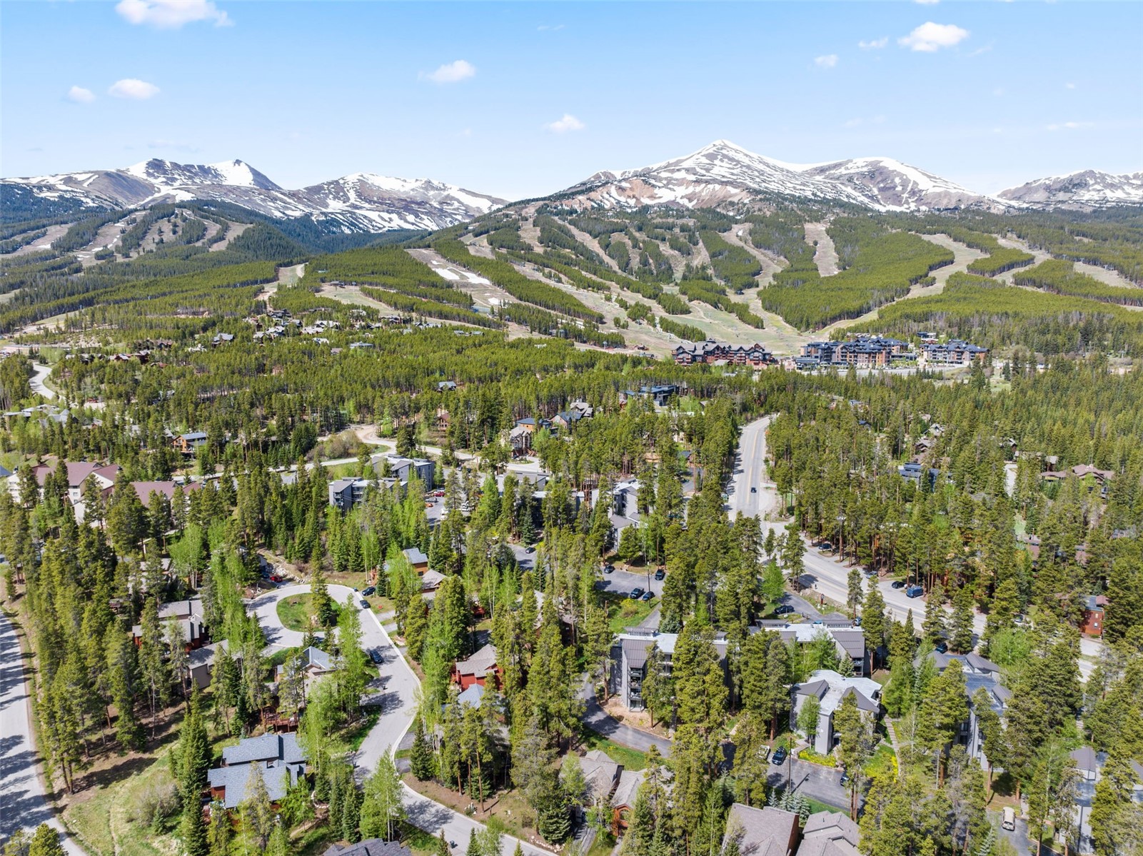 1127 Ski Hill Road, Unit 104 Breckenridge, CO 80424 - Photo 32 of 32 a view of a city with mountains in the background