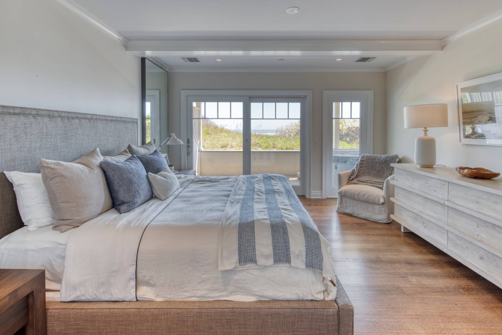 272 Old Montauk Highway, Unit 9 Montauk, NY 11954 - Photo 12 of 26 a living room with furniture and a large window
