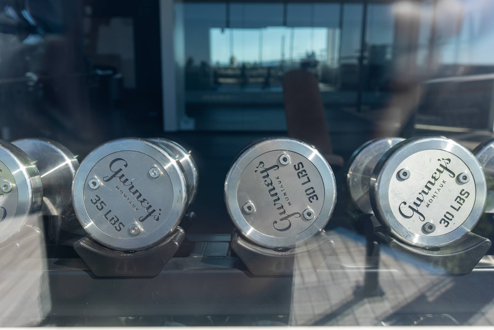 272 Old Montauk Highway, Unit 9 Montauk, NY 11954 - Photo 19 of 26 a clock on a table and a clock on wall
