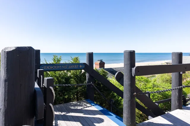 a view of balcony with wooden floor