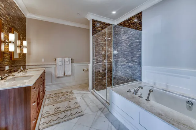 a bathroom with a bathtub and a sink