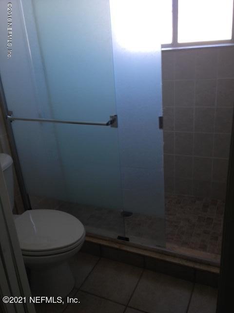 9745 Touchton Road, Unit 1823 Jacksonville, FL 32246 - Photo 12 of 18 a bathroom with a toilet