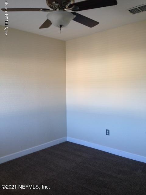 9745 Touchton Road, Unit 1823 Jacksonville, FL 32246 - Photo 14 of 18 a view of a room with an empty space