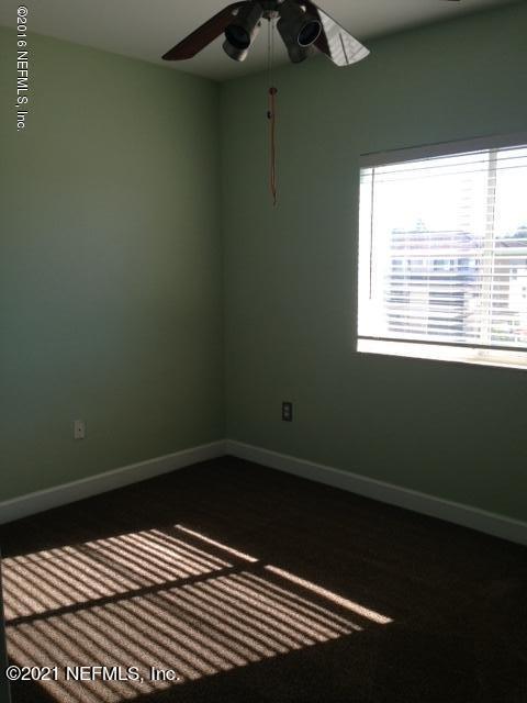 9745 Touchton Road, Unit 1823 Jacksonville, FL 32246 - Photo 15 of 18 a view of a room with a window