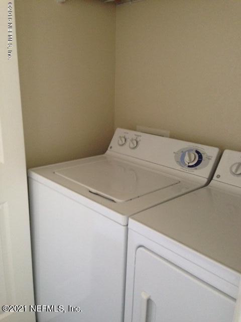 9745 Touchton Road, Unit 1823 Jacksonville, FL 32246 - Photo 18 of 18 a utility room with dryer and washer