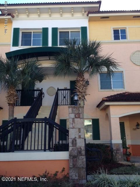 9745 Touchton Road, Unit 1823 Jacksonville, FL 32246 - Photo 2 of 18 a view of a house with a patio
