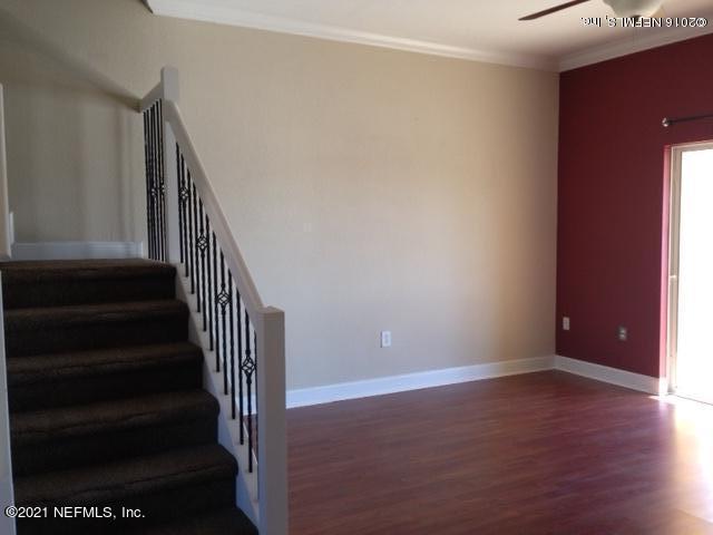 9745 Touchton Road, Unit 1823 Jacksonville, FL 32246 - Photo 9 of 18 a view of entryway with wooden floor