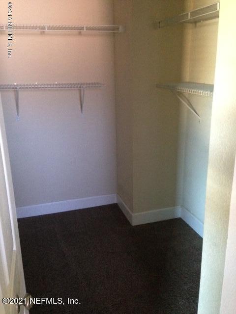 9745 Touchton Road, Unit 1823 Jacksonville, FL 32246 - Photo 10 of 18 a view of small space with racks on the wall