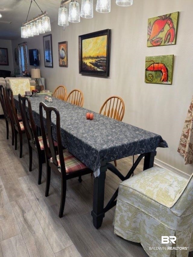 8100 Coden Belt Road West Coden, AL 36523 - Photo 6 of 12 Dining area with hardwood / wood-style flooring